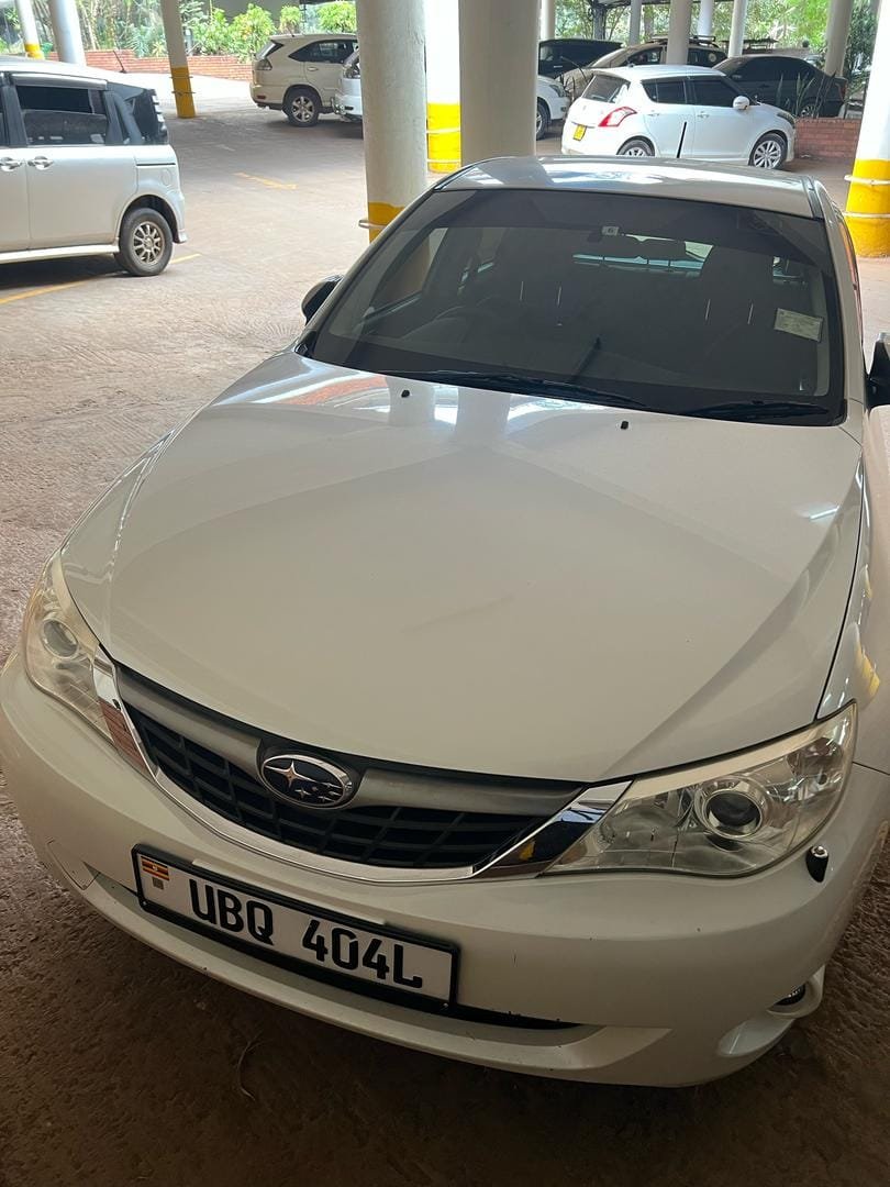 white Subaru Impreza