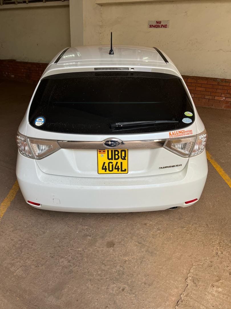 white Subaru Impreza