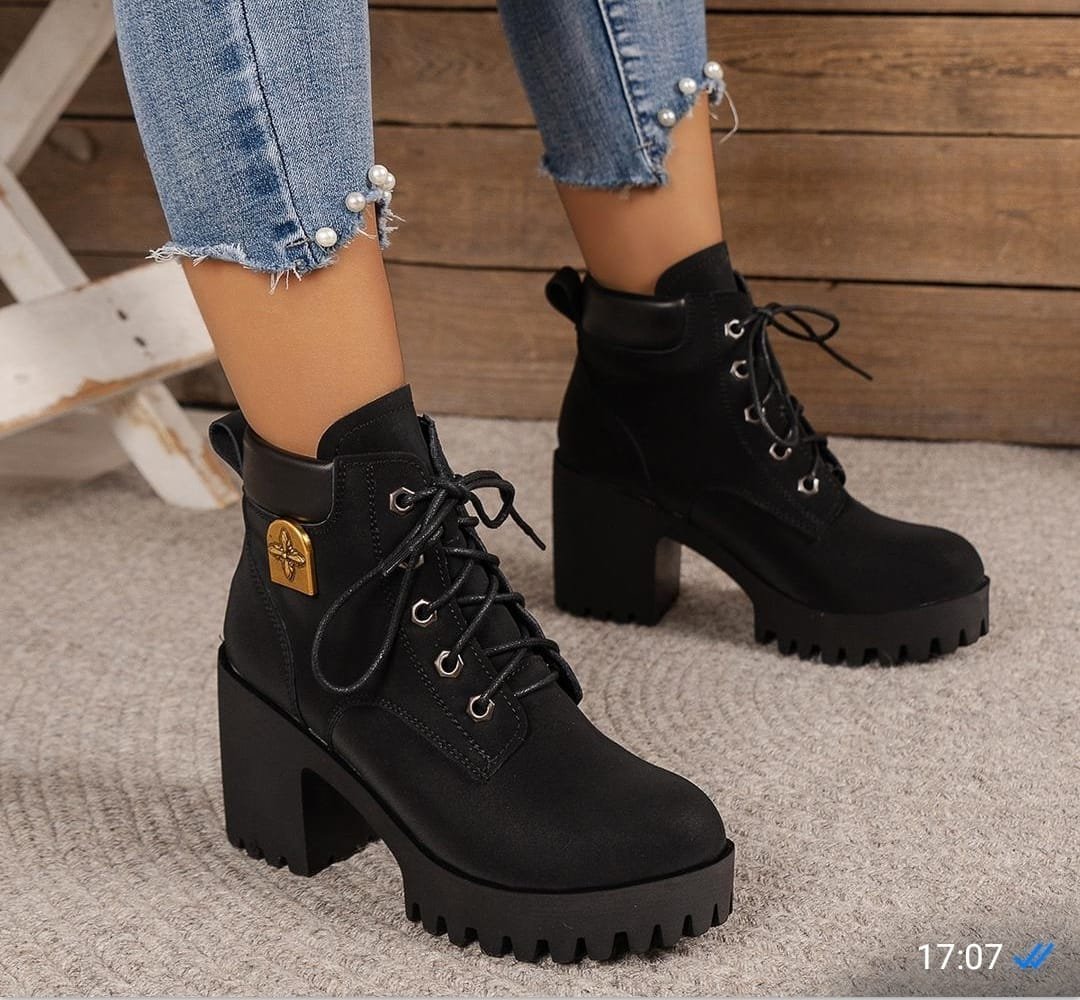 pair of black, chunky heel ankle boots