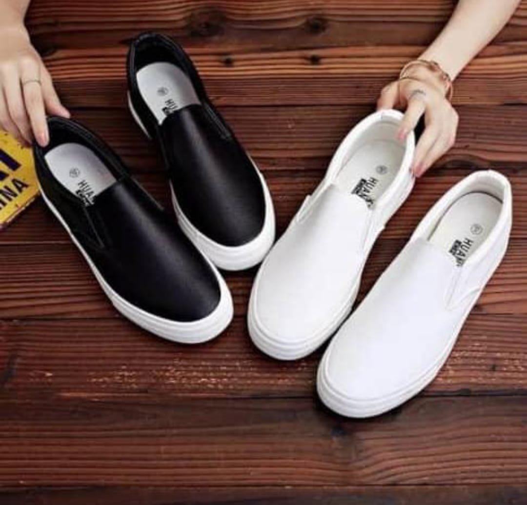 two pairs of slip-on shoes