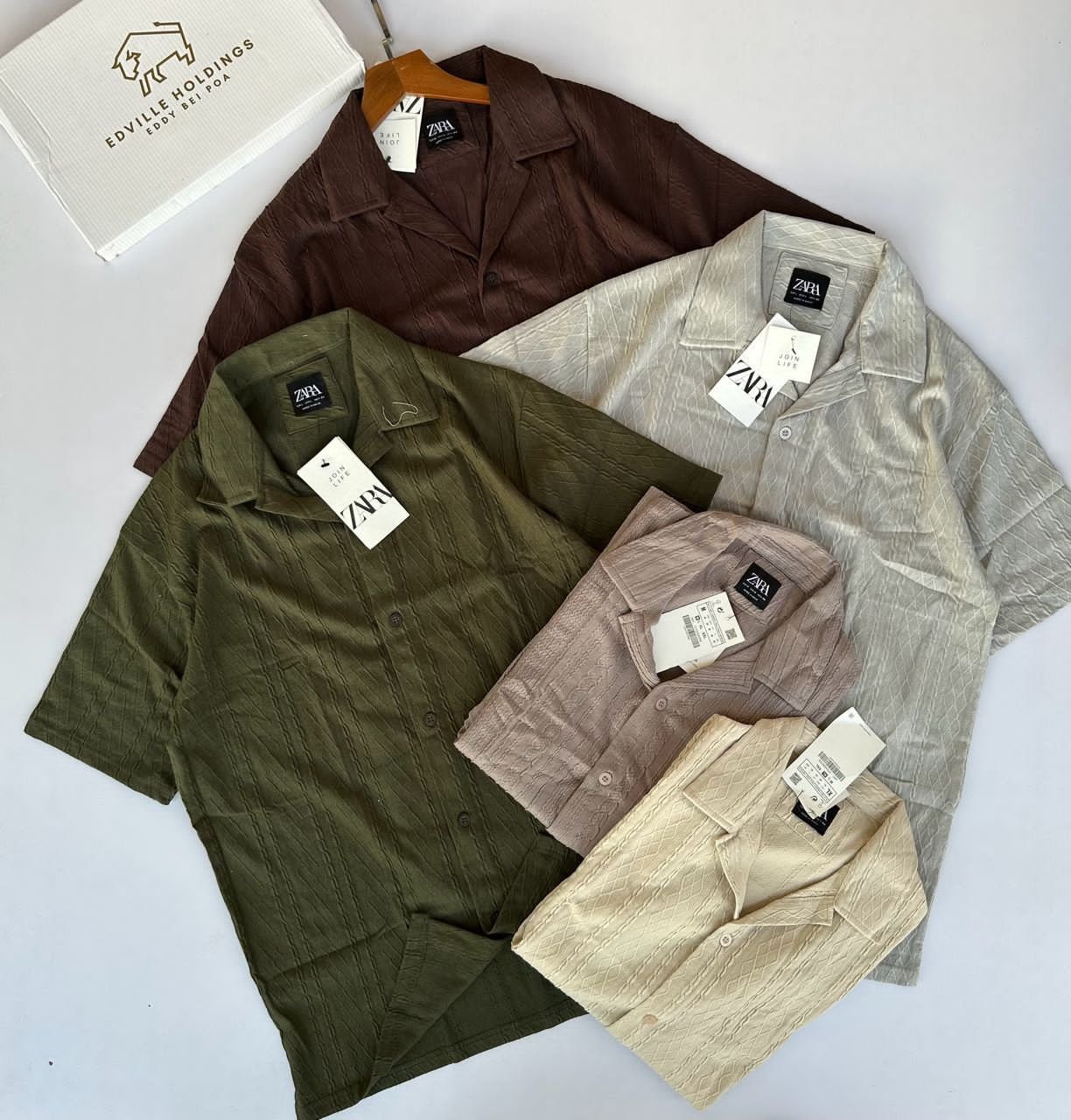 five short-sleeved button-down shirts