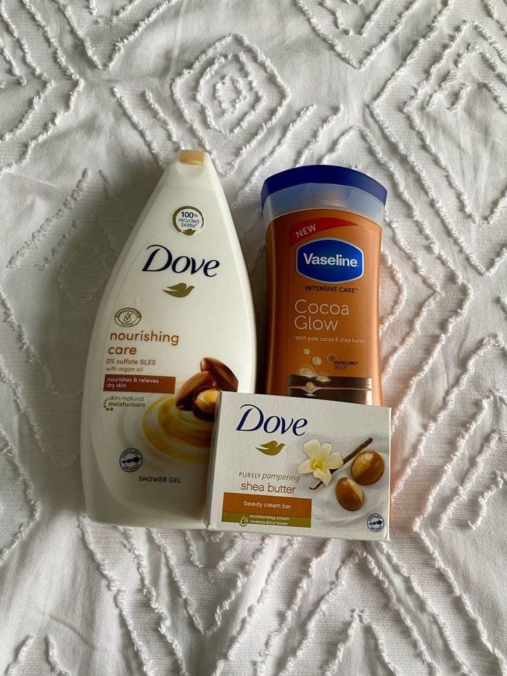 Dove Nourishing Care Shower Gel, Vaseline Intensive Care Cocoa Glow Body Lotion, and Dove Purely Pampering Shea Butter Beauty Cream Bar