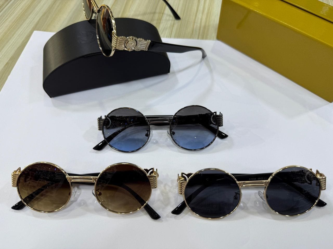 round sunglasses with distinct frame and lens colors