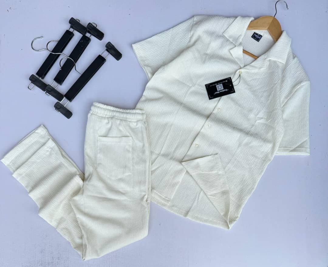 white short-sleeve button-down shirt and matching pants,