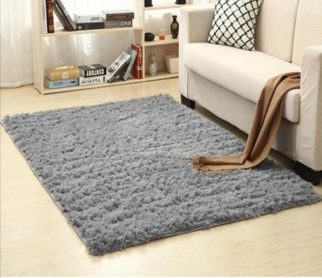 gray, rectangular, shaggy carpet