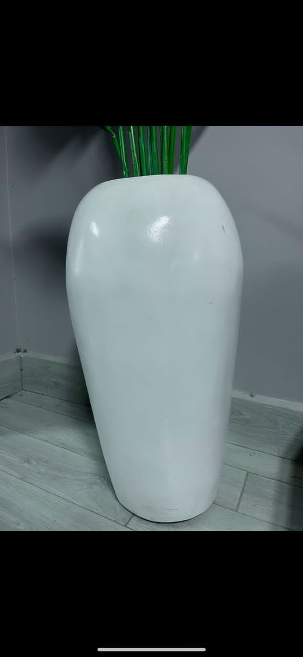 egg-shaped ceramic flower vase