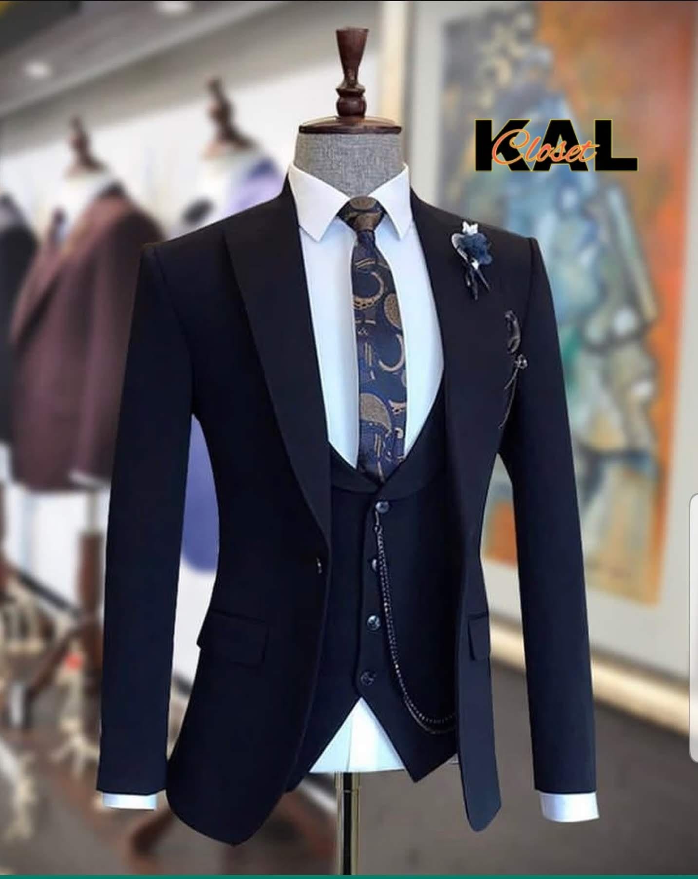 dark blue three-piece suit