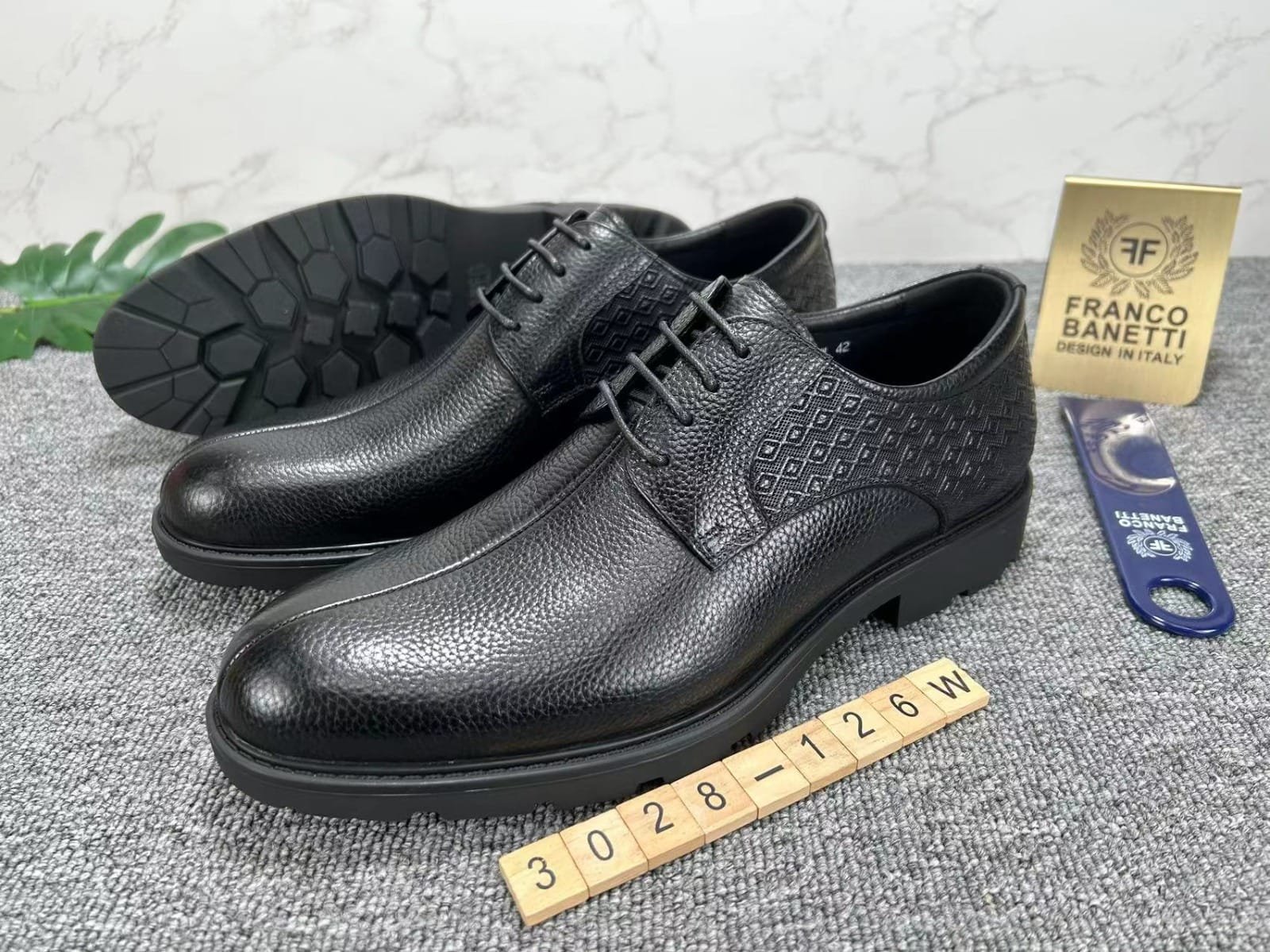 black leather Franco Banetti dress shoes.