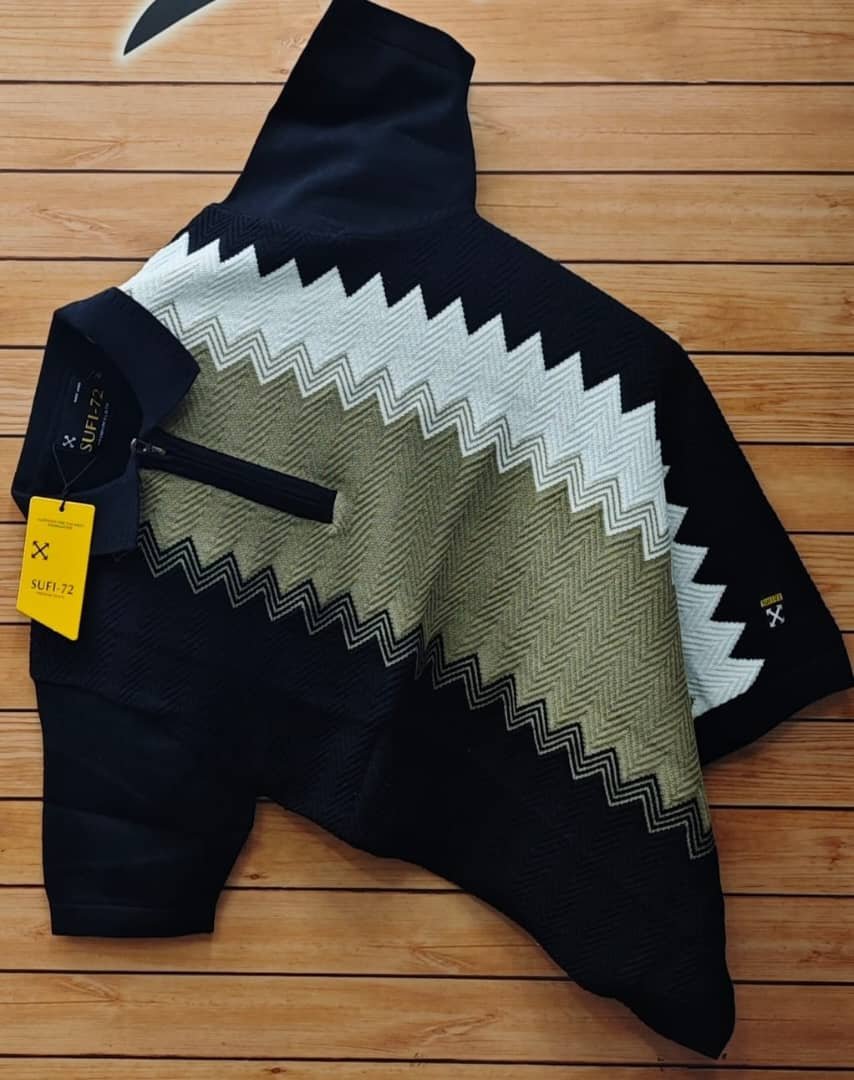 a black, white, and brown long-sleeved collared shirt