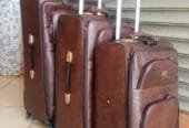 black leather suitcases