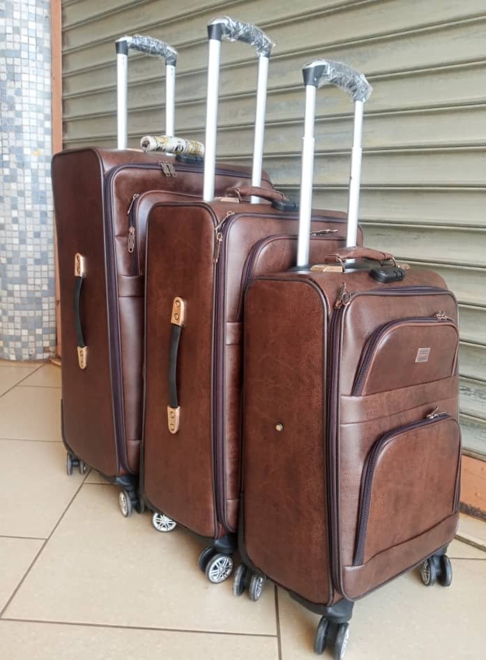 black leather suitcases