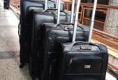 black leather suitcases