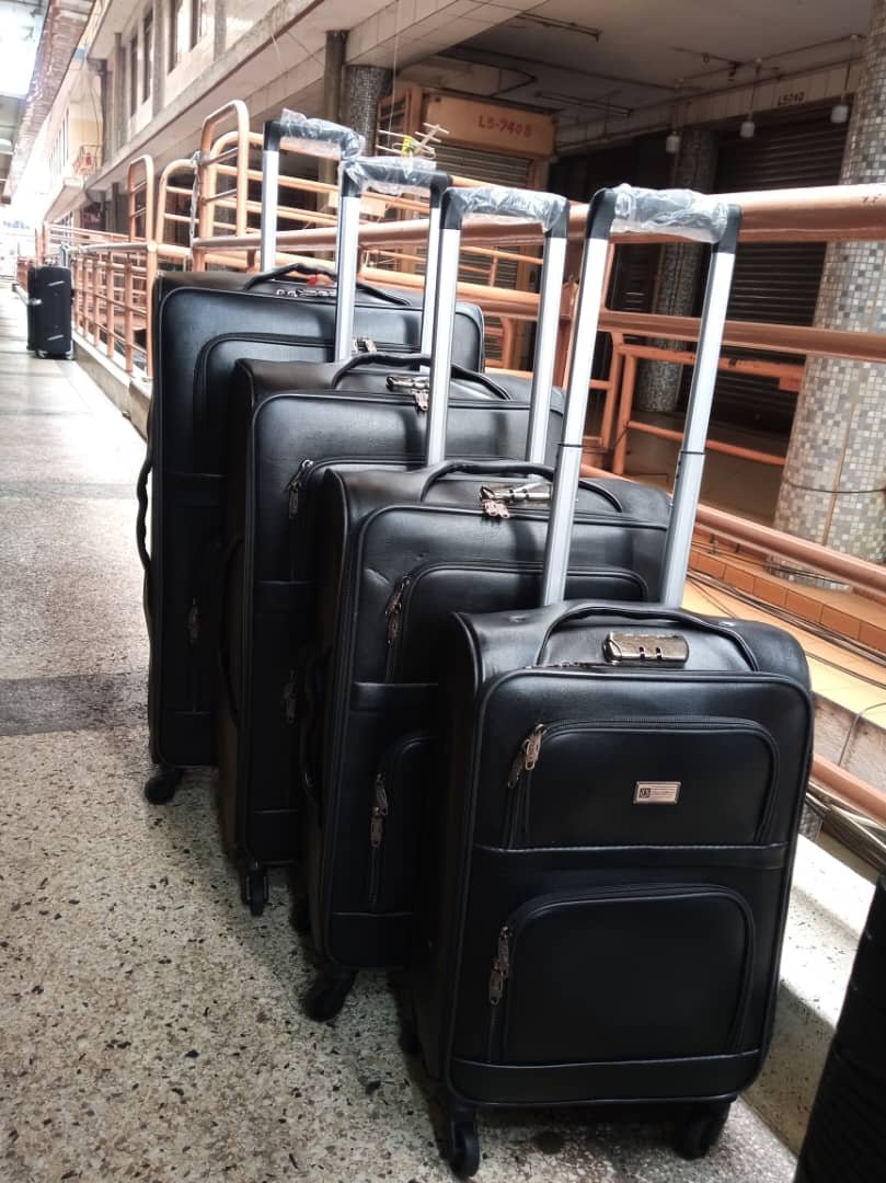 black leather suitcases