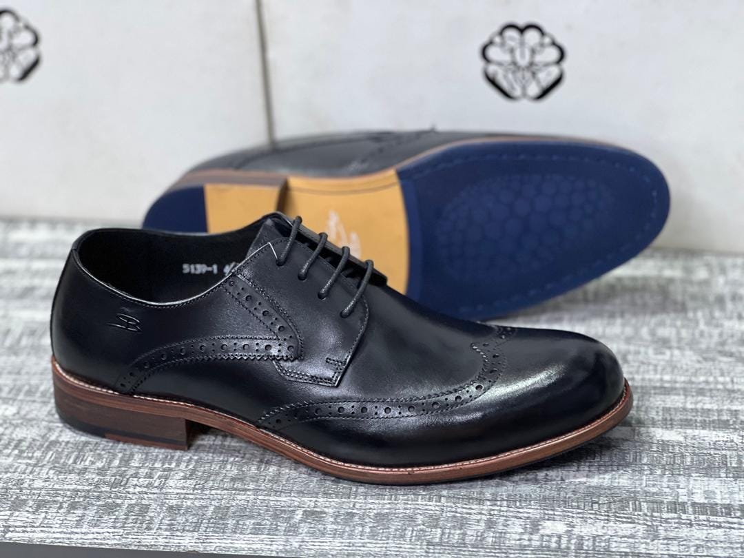 black leather wingtip Oxford dress shoes