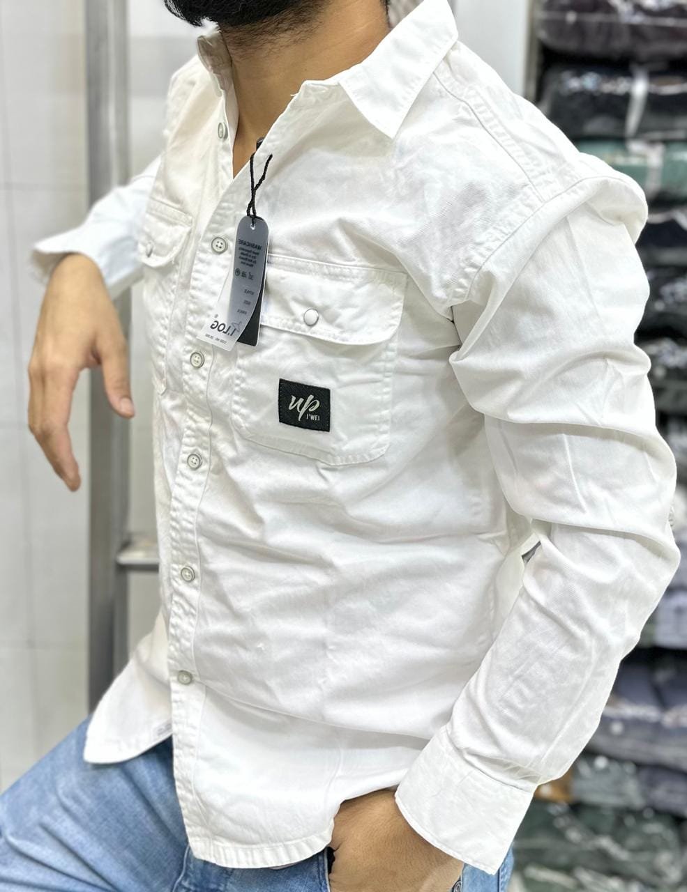 white, long-sleeved button-down shirt