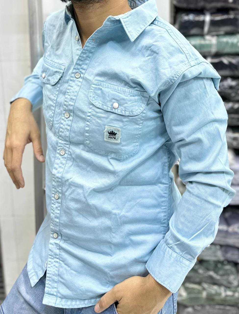 light blue, long-sleeved denim shirt