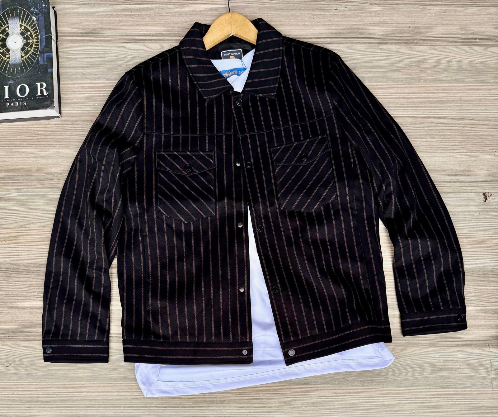 dark-colored, button-down shirt