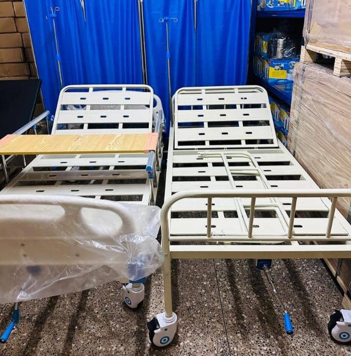 white metal hospital beds