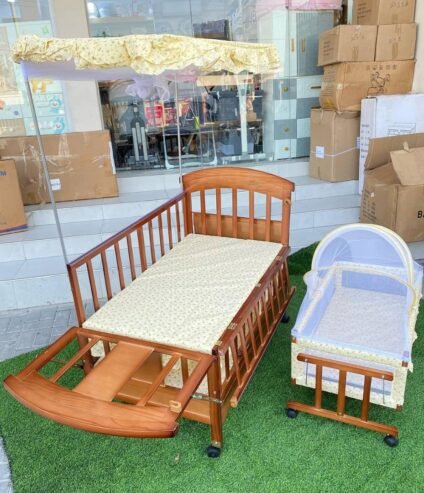 two wooden cots