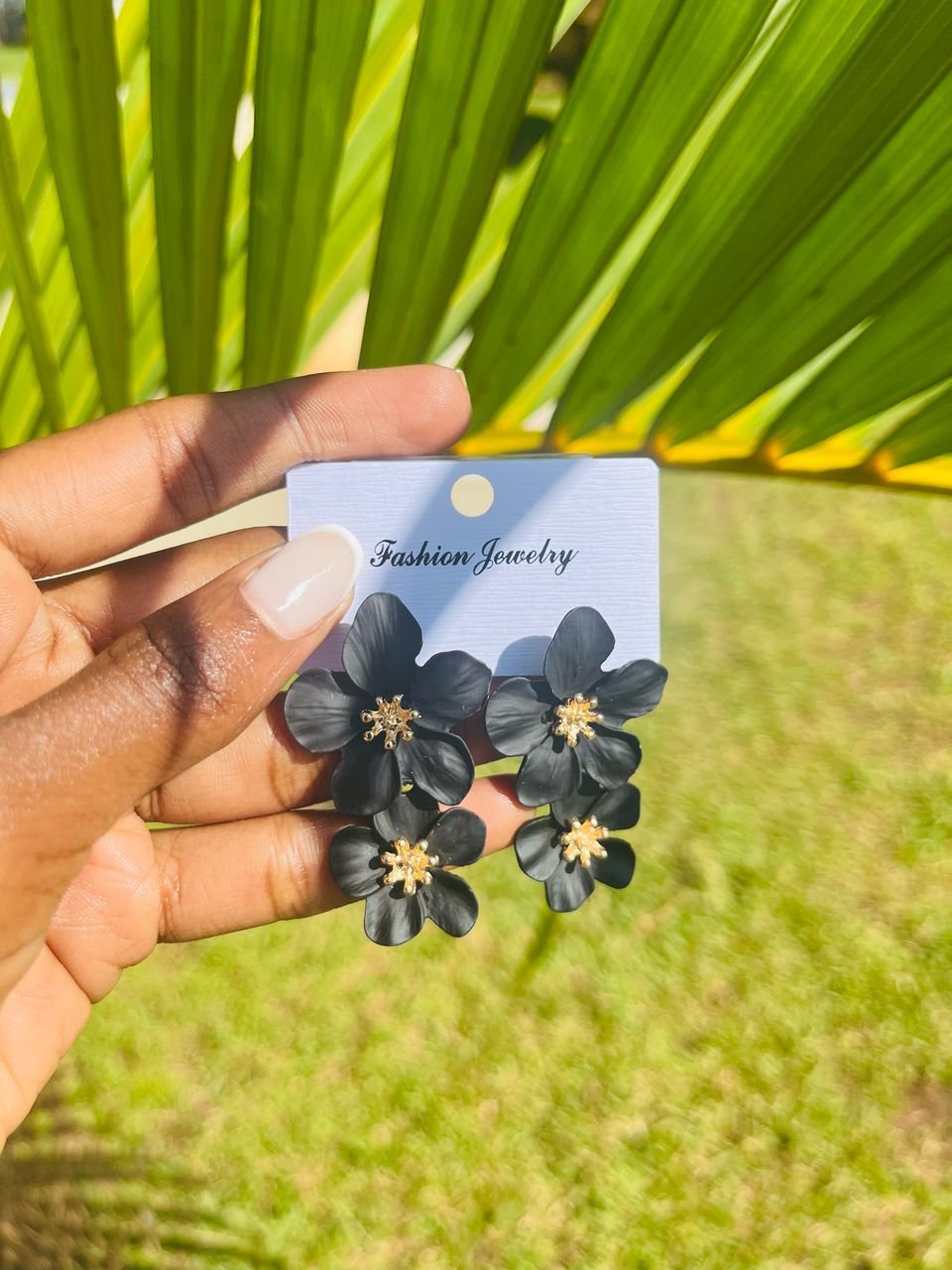 black, double-flower design earrings