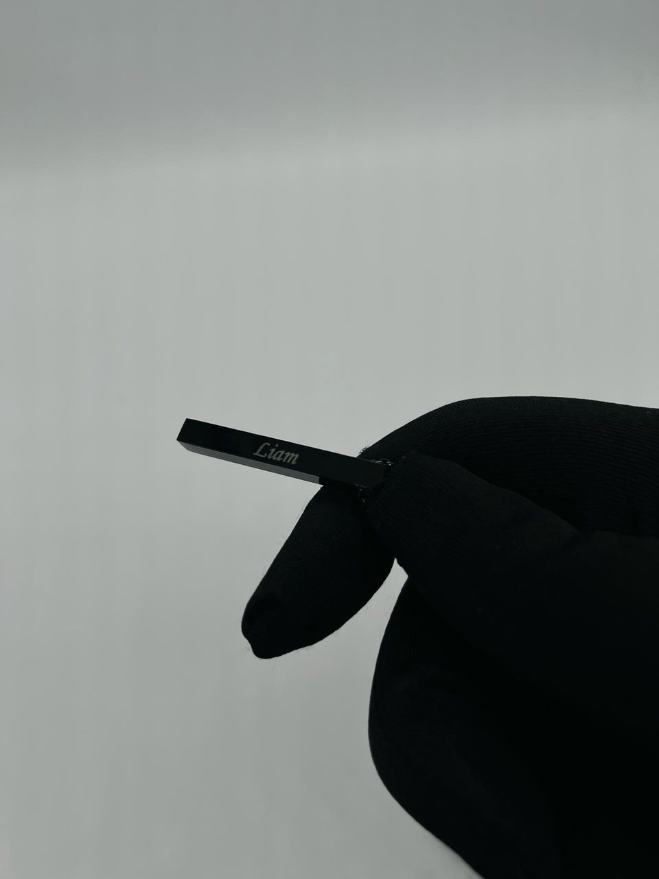 black bar-shaped pendant