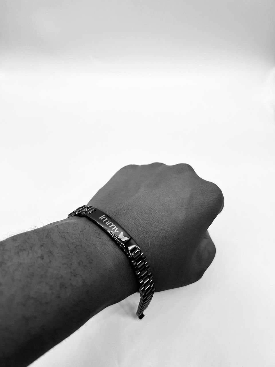 black or dark-toned metal link bracelet