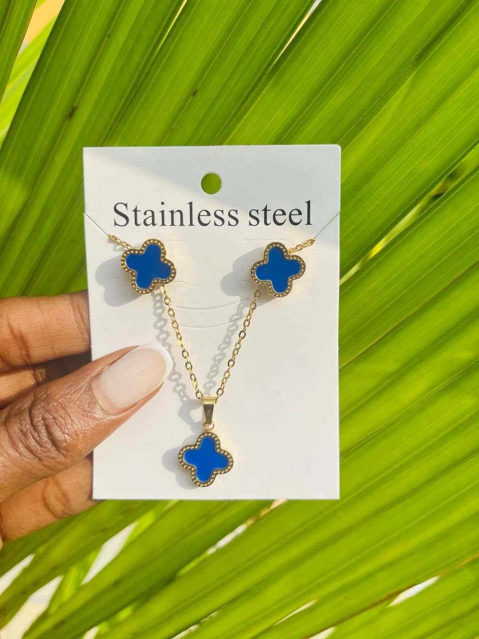 necklace with a pendant and matching earrings