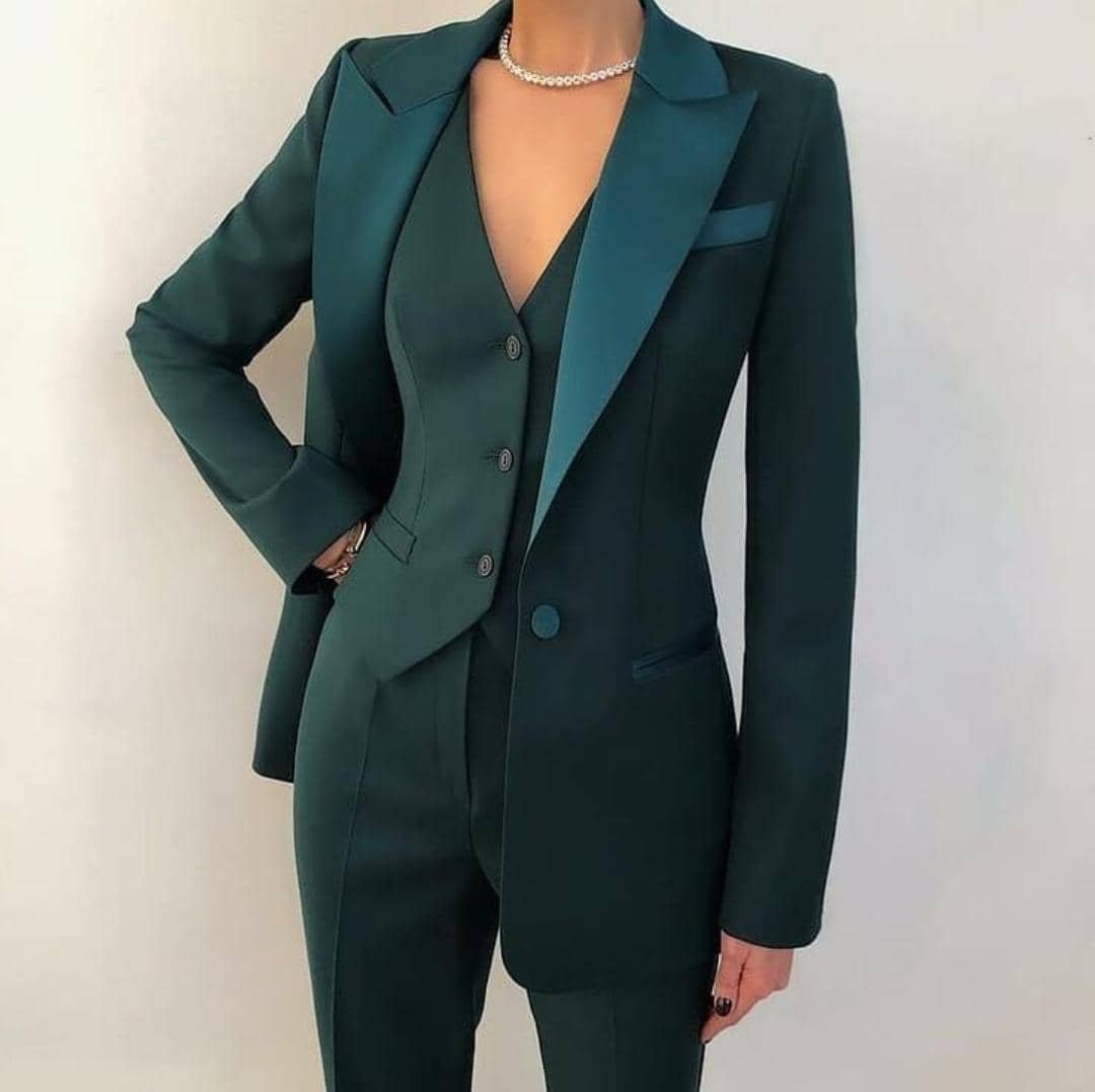 three-piece suit in dark green,