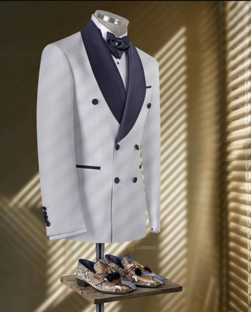 white, double-breasted men’s suit