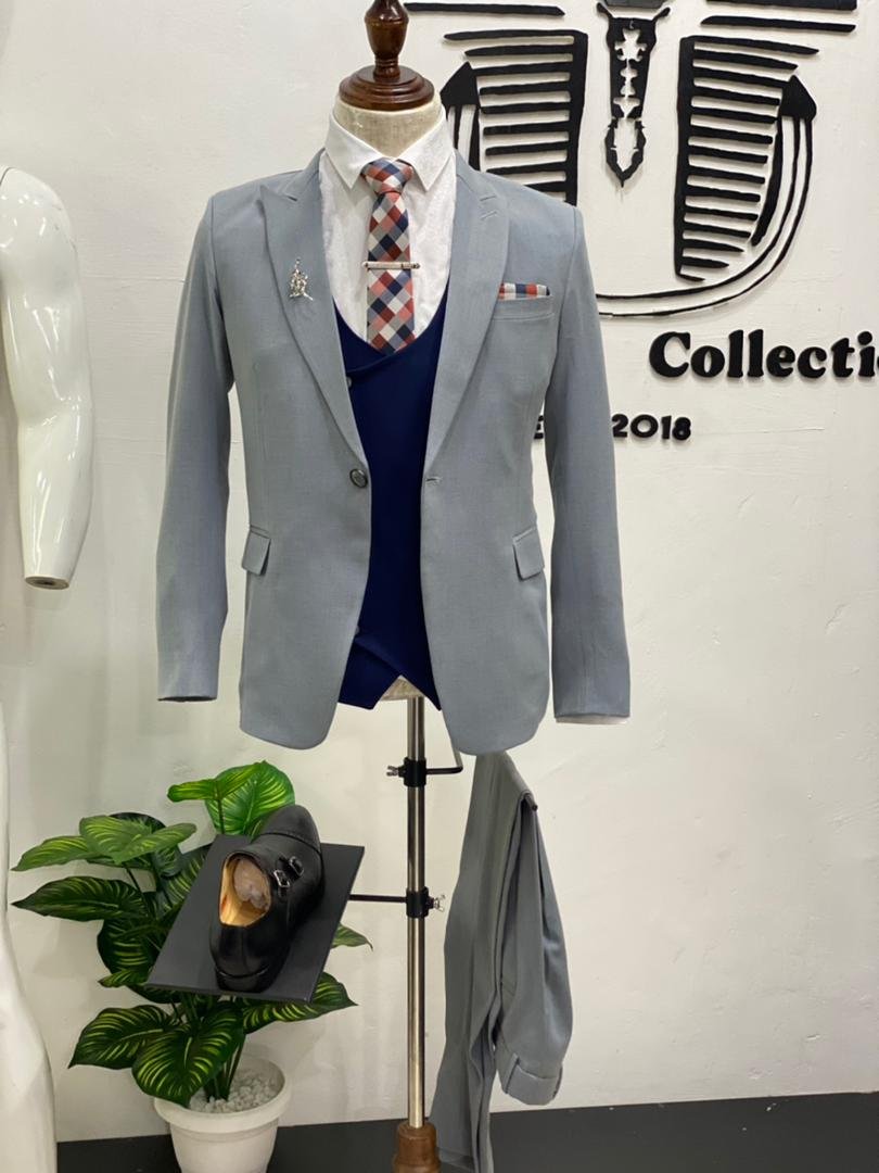 light gray, three-piece suit