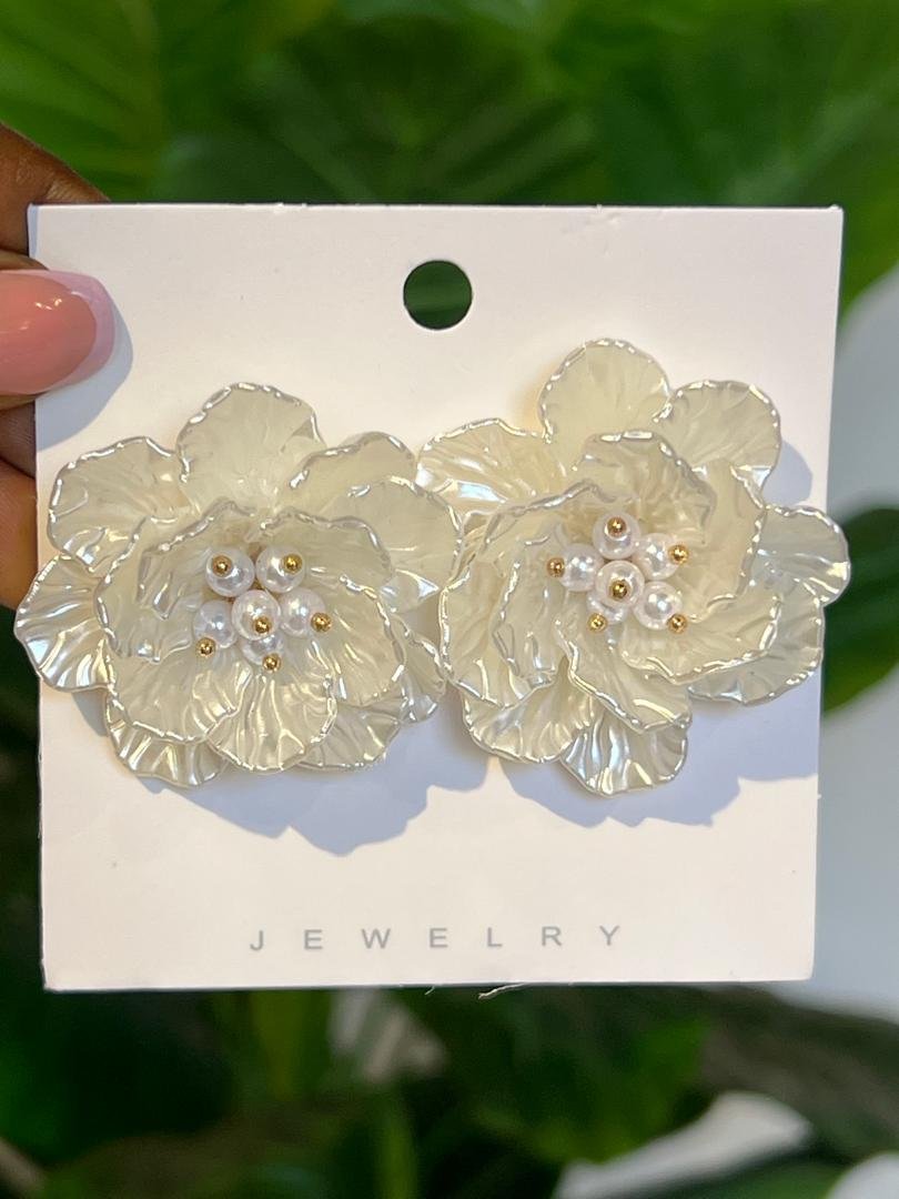 white, flower-shaped stud earrings