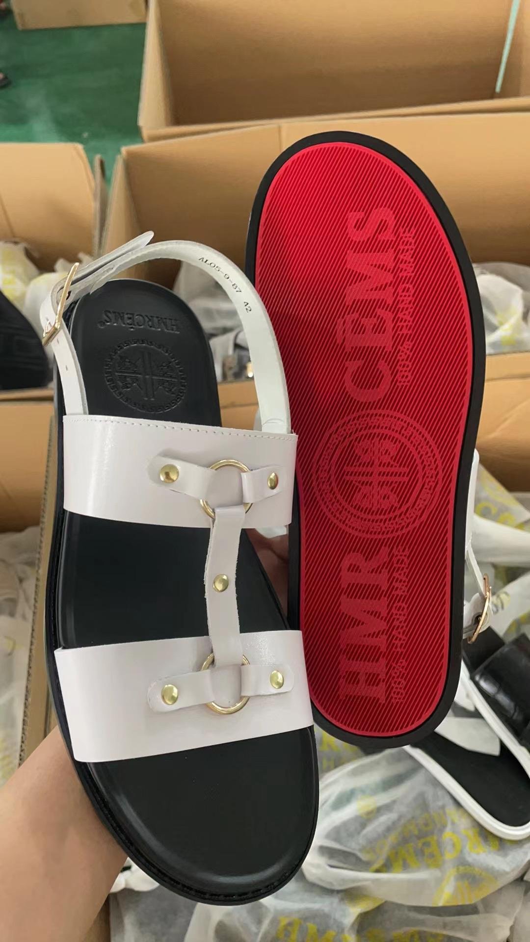 pair of men’s sandals,