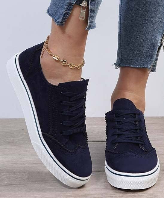 women’s lace-up flat sneakers