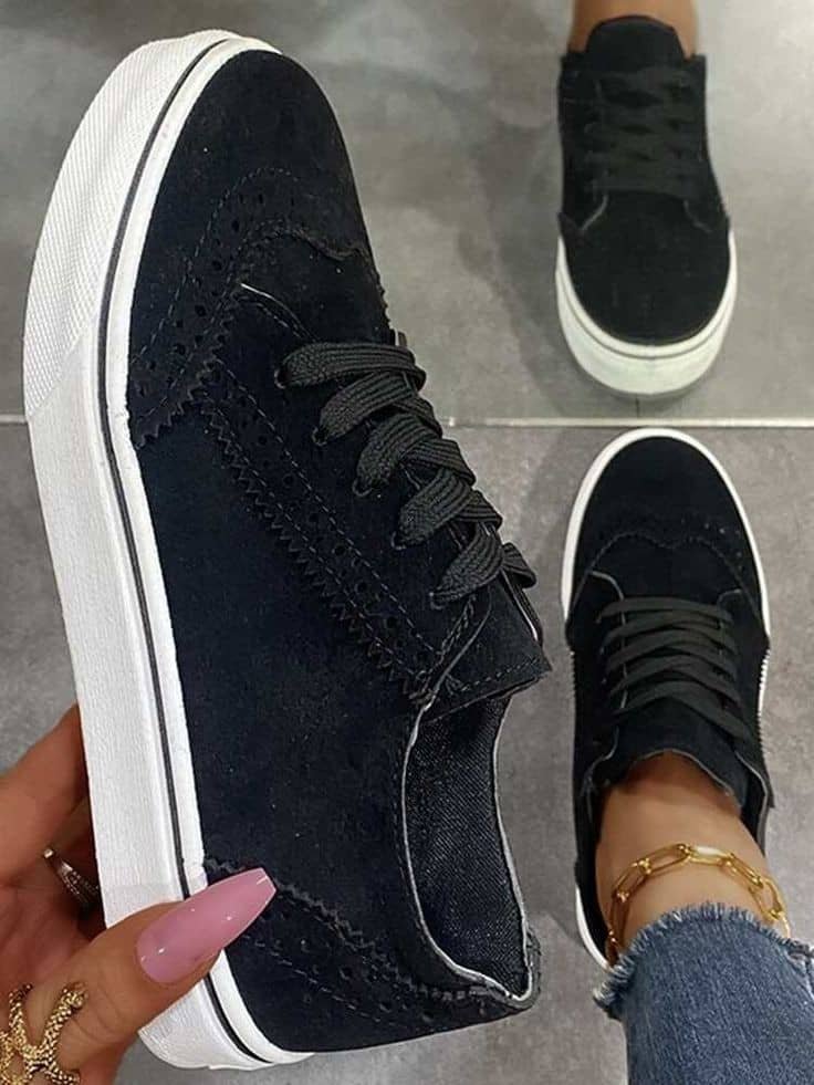 black low-top canvas sneakers.