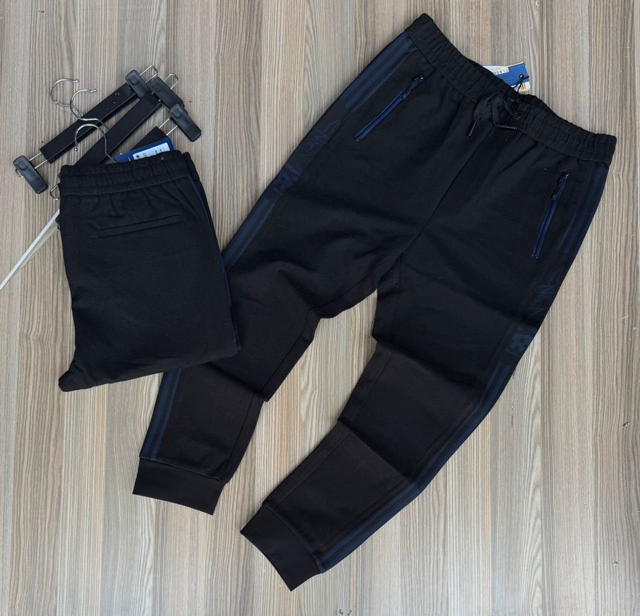 black tracksuit bottoms