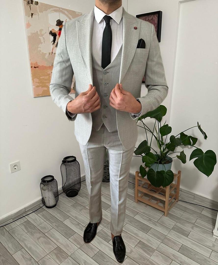 men’s light grey three-piece suit