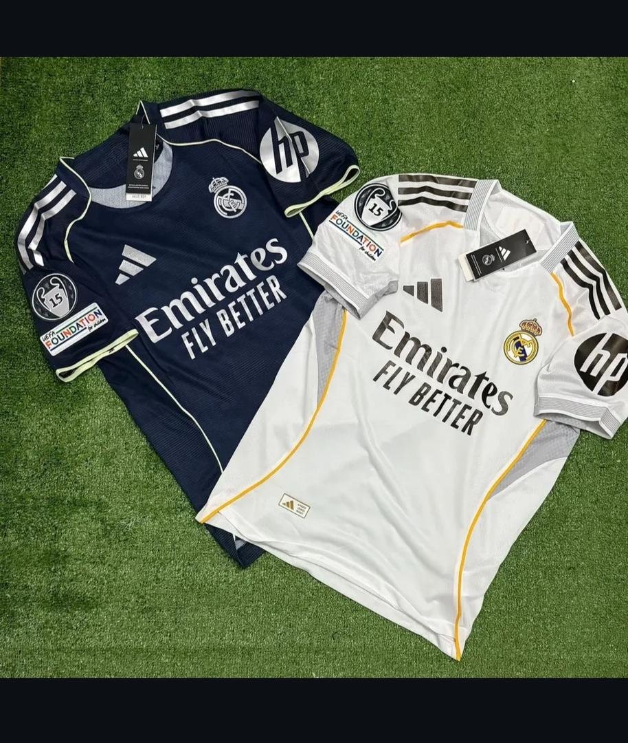 home jersey (white) and the away jersey (dark navy blue