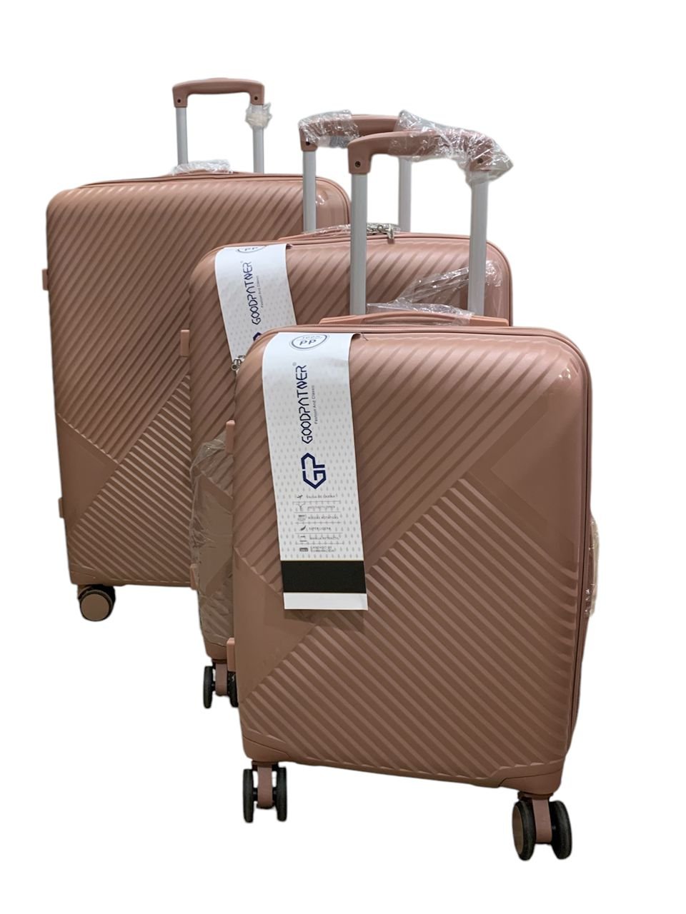 set of three hard-shell suitcases