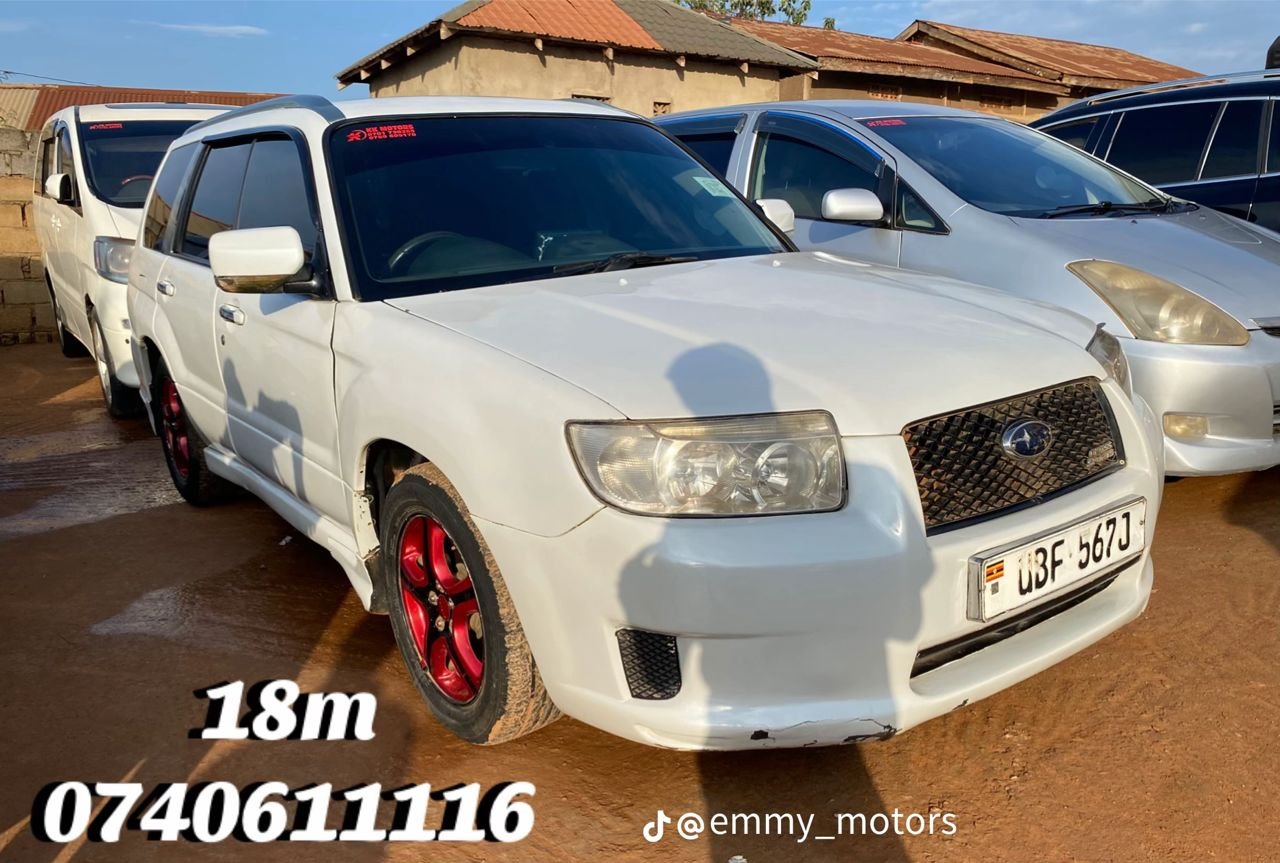 white Subaru Forester.