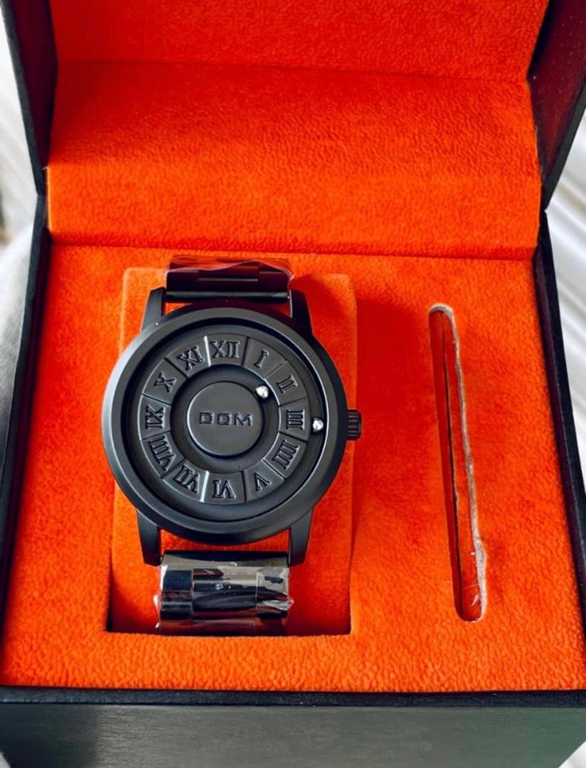 DOM Magnetic Rolling Ball Men’s Black Metal Analog Wrist Watch.