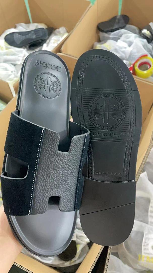 black “BMRCEMS” brand sandals