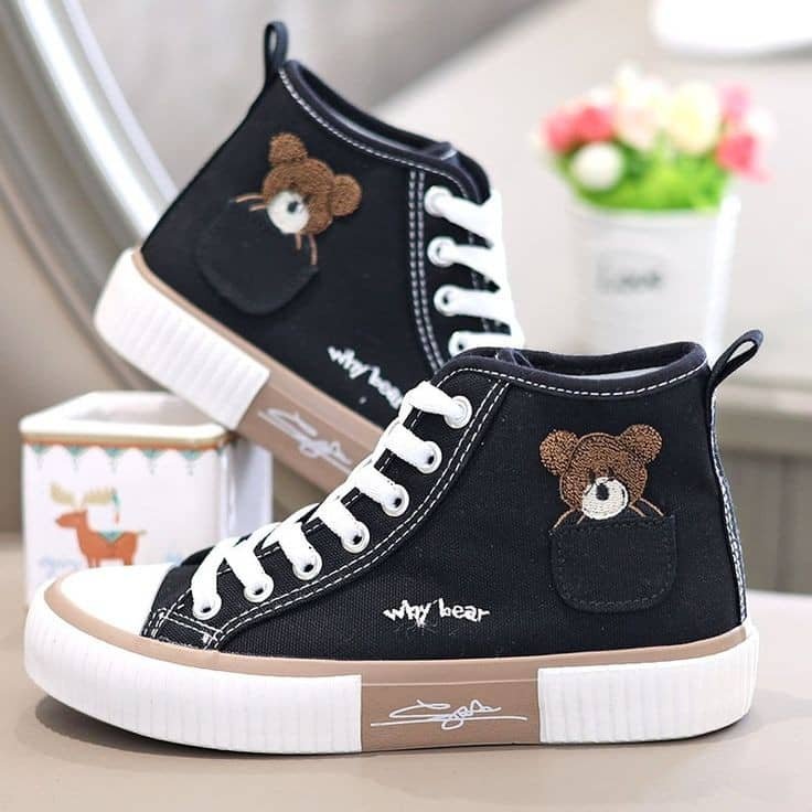 black, high-top canvas sneakers