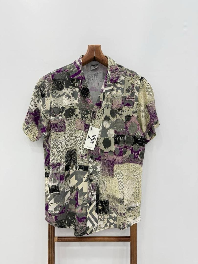 short-sleeved, patterned shirt.