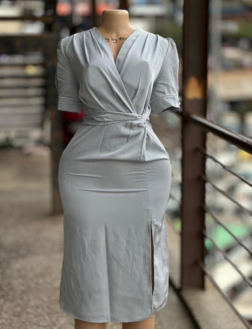 light blue/grey dress,