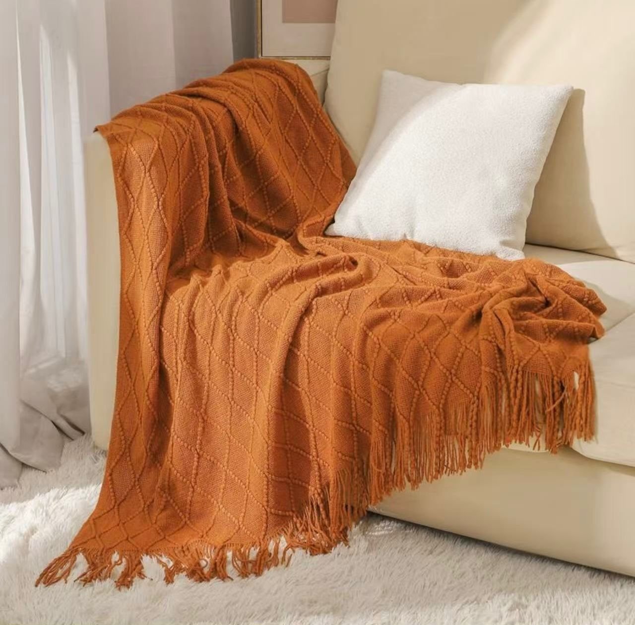 knitted orange blanket