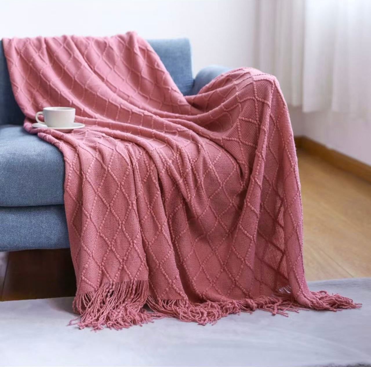 knitted pink blanket
