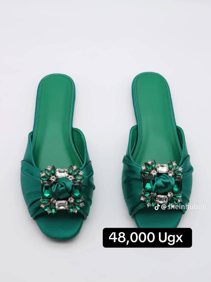 green slip-on flat sandals