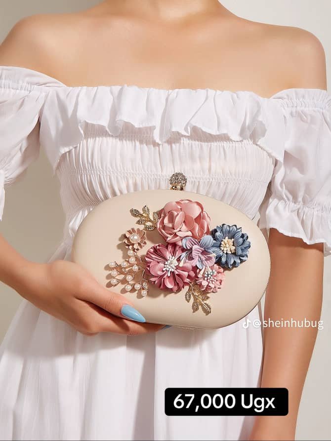 Beige, oval-shaped clutch bag