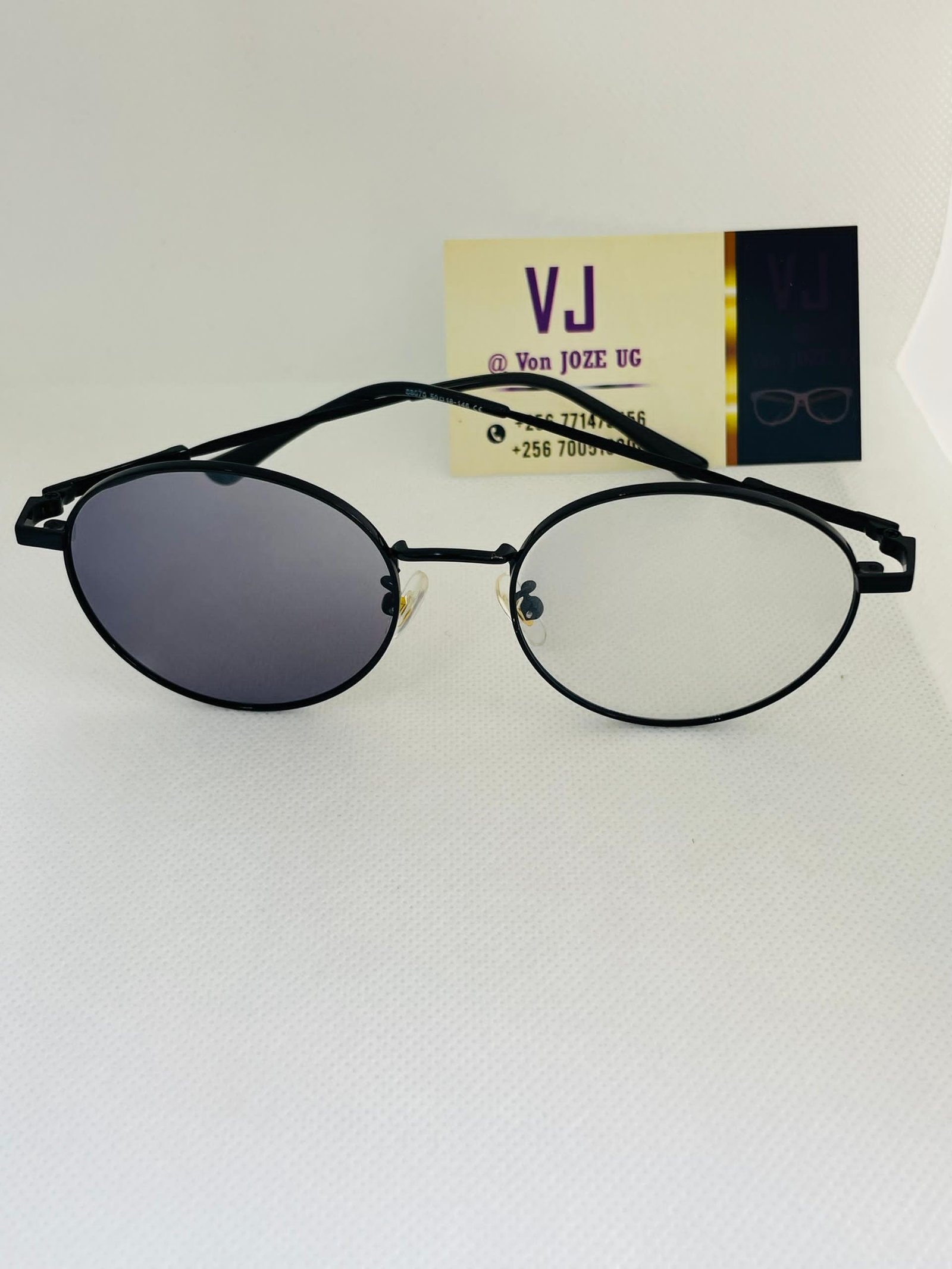 pair of round, metal-framed sunglasses