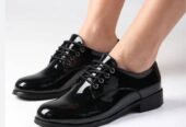 women’s black patent leather Oxford